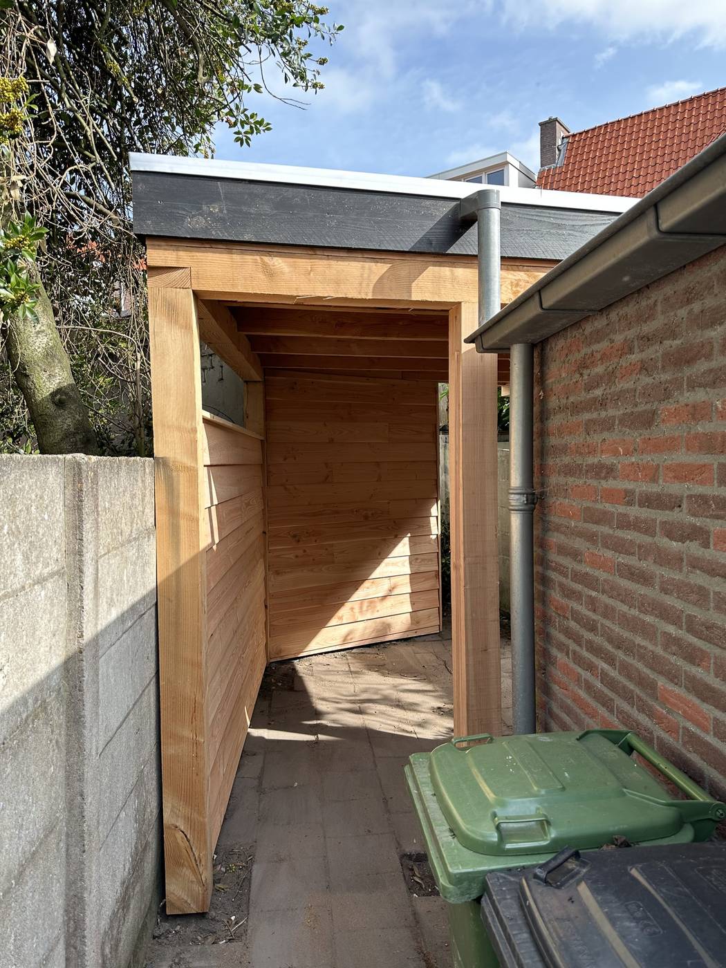 Overkapping fietsenstalling en zithoek - foto 3